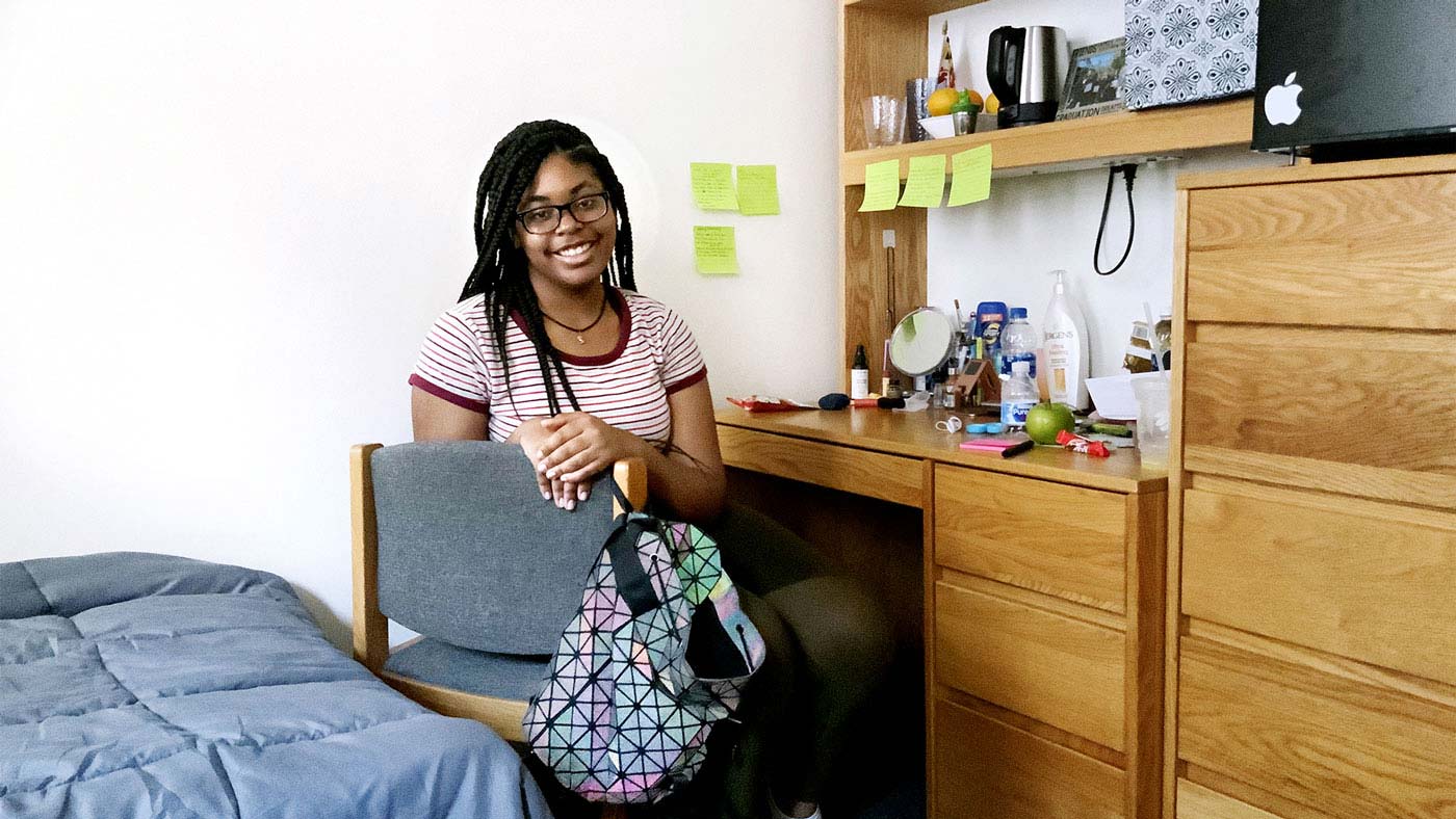 Madison Hall poses for a self-portrait while in quarantine inside her NYU dorm room.