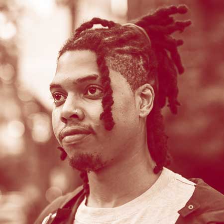 Photo of a dimly lit room with a computer interface terminal.