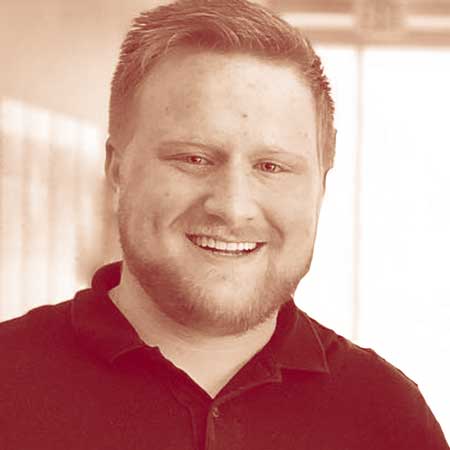 Photo of a dimly lit room with a computer interface terminal.